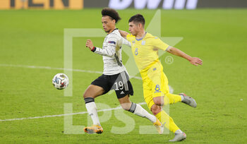 2020-11-15 - Leroy Sane of Germany and Ruslan Malinovskiy of Uktaine during the UEFA Nations League, qualifying football match between Germany and Uktaine on November 14, 2020 at Red Bull Arena in Leipzig, Germany - Photo Ralf Ibing / firo Sportphoto / DPPI - GERMANY VS UKRAINE - UEFA NATIONS LEAGUE - SOCCER
