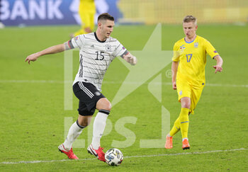 2020-11-15 - Niklas Sule of Germany and Oleksandr Zinchenko of Ukraine during the UEFA Nations League, qualifying football match between Germany and Uktaine on November 14, 2020 at Red Bull Arena in Leipzig, Germany - Photo Ralf Ibing / firo Sportphoto / DPPI - GERMANY VS UKRAINE - UEFA NATIONS LEAGUE - SOCCER