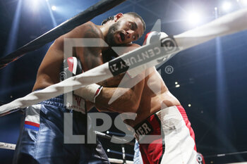2020-11-27 - Tony Yoka of France and Christian Hammer of Germany during the heavyweight boxing bout between Tony Yoka (FRA) and Christian Hammer (GER) on November 27, 2020 at the H Arena in Nantes, France - Photo Laurent Lairys / DPPI - HEAVYWEIGHT BOXING BOUT BETWEEN TONY YOKA (FRA) AND CHRISTIAN HAMMER (GER) - BOXING - CONTACT