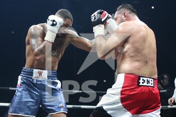 2020-11-27 - Tony Yoka of France and Christian Hammer of Germany during the heavyweight boxing bout between Tony Yoka (FRA) and Christian Hammer (GER) on November 27, 2020 at the H Arena in Nantes, France - Photo Laurent Lairys / DPPI - HEAVYWEIGHT BOXING BOUT BETWEEN TONY YOKA (FRA) AND CHRISTIAN HAMMER (GER) - BOXING - CONTACT
