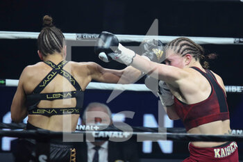 2021-03-05 - Estelle Yoka-Mossely of France and Verena Kaiser of Germany during the IBO Lightweight World championship boxing event between Estelle Mossely-Yoka and Verena Kaiser on March 5, 2021 at the H Arena in Nantes, France - Photo Laurent Lairys / DPPI - ESTELLE MOSSELY-YOKA VS VERENA KAISER - BOXING - CONTACT