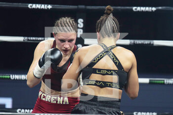 2021-03-05 - Verena Kaiser of Germany and Estelle Yoka-Mossely of France during the IBO Lightweight World championship boxing event between Estelle Mossely-Yoka and Verena Kaiser on March 5, 2021 at the H Arena in Nantes, France - Photo Laurent Lairys / DPPI - ESTELLE MOSSELY-YOKA VS VERENA KAISER - BOXING - CONTACT