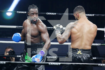 2021-03-06 - Joel Tambwe Djeko of Belgium and Tony Yoka of France during the Heavyweight Europe championship, boxing event between Tony Yoka and Joel Tambwe Djeko on March 5, 2021 at H Arena in Nantes, France - Photo Laurent Lairys / DPPI - TONY YOKA VS JOEL TAMBWE DJEKO - BOXING - CONTACT
