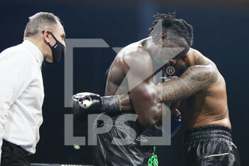 2021-03-06 - Joel Tambwe Djeko of Belgium and Tony Yoka of France during the Heavyweight Europe championship, boxing event between Tony Yoka and Joel Tambwe Djeko on March 5, 2021 at H Arena in Nantes, France - Photo Laurent Lairys / DPPI - TONY YOKA VS JOEL TAMBWE DJEKO - BOXING - CONTACT