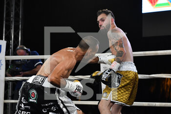 2021-06-25 - Emiliano Marsili  defeat Stephane Jamoye during the IBO Mediterranean Lightweight Title 2021 on July 25, 2021 at Piazzale della Vita - La Marina  in Civitavecchia, Italy - IBO MEDITERRANEAN LIGHTWEIGHT TITLE 2021 - BOXING - CONTACT