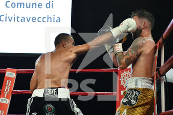 2021-06-25 - Emiliano Marsili  defeat Stephane Jamoye during the IBO Mediterranean Lightweight Title 2021 on July 25, 2021 at Piazzale della Vita - La Marina  in Civitavecchia, Italy - IBO MEDITERRANEAN LIGHTWEIGHT TITLE 2021 - BOXING - CONTACT