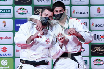 2021-06-11 - Varlam Liparteliani of Georgia winner of the bronze medal, Ilia Sulamanidze of Georgia winner of the bronze medal men -100 kg during the IJF World Judo Championships 2021 on June 11, 2021 at Budapest Sports Arena in Budapest, Hungary - Photo Yannick Verhoeven / Orange Pictures / DPPI - IJF WORLD JUDO CHAMPIONSHIPS 2021 - JUDO - CONTACT