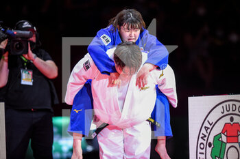 2021-06-12 - Sarah Asahina of Japan carry Wakaba Tomita of Japan on her back during the final for +78 women during the IJF World Judo Championships 2021 on June 12, 2021 at Budapest Sports Arena in Budapest, Hungary - Photo Yannick Verhoeven / Orange Pictures / DPPI - IJF WORLD JUDO CHAMPIONSHIPS 2021 - JUDO - CONTACT