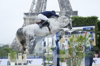 2021-06-25 - Roger Yves BOST (FRA) riding CASSIUS CLAY VDV Z, Le Figaroscope Prize during the Longines Paris Eiffel Jumping 2021, Longines Global Champions Tour Equestrian CSI 5 on June 25, 2021 at Champ de Mars in Paris, France - Photo Christophe Bricot / DPPI - LONGINES PARIS EIFFEL JUMPING 2021, LONGINES GLOBAL CHAMPIONS TOUR EQUESTRIAN CSI 5 - INTERNATIONALS - EQUESTRIAN