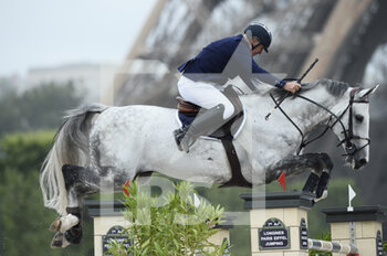 2021-06-25 - Roger Yves BOST (FRA) riding CASSIUS CLAY VDV Z, Le Figaroscope Prize during the Longines Paris Eiffel Jumping 2021, Longines Global Champions Tour Equestrian CSI 5 on June 25, 2021 at Champ de Mars in Paris, France - Photo Christophe Bricot / DPPI - LONGINES PARIS EIFFEL JUMPING 2021, LONGINES GLOBAL CHAMPIONS TOUR EQUESTRIAN CSI 5 - INTERNATIONALS - EQUESTRIAN