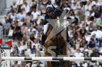 2021-06-26 - Julien ANQUETIN (FRA) riding BLOOD DIAMOND DU PONT, Global Champions League, second competition presented by Metrobus Prize during the Longines Paris Eiffel Jumping 2021, Longines Global Champions Tour Equestrian CSI 5 on June 26, 2021 at Champ de Mars in Paris, France - Photo Christophe Bricot / DPPI - LONGINES PARIS EIFFEL JUMPING 2021, LONGINES GLOBAL CHAMPIONS TOUR EQUESTRIAN CSI 5 - INTERNATIONALS - EQUESTRIAN