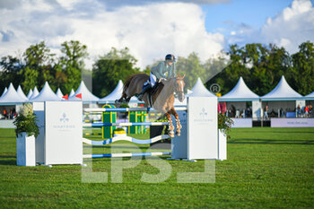 2021-07-10 - Marie Demonte of France riding Manchester during the M1 Ducati Table A against the clock 1m50 with jump off, of the Masters Chantilly 2021, FEI equestrian event, Jumping CSI5 on July 10, 2021 at Chateau de Chantilly in Chantilly, France - Photo Victor Joly / DPPI - MASTERS CHANTILLY 2021, FEI EQUESTRIAN EVENT, JUMPING CSI5 - INTERNATIONALS - EQUESTRIAN