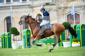 2021-07-11 - Denis Lynch of Ireland riding Gc Chopin's Bushi during the Rolex Grand Prix Table A against the clock 1m60 with jump off, of the Masters Chantilly 2021, FEI equestrian event, Jumping CSI5 on July 11, 2021 at Chateau de Chantilly in Chantilly, France - Photo Victor Joly / DPPI - MASTERS CHANTILLY 2021, FEI EQUESTRIAN EVENT, JUMPING CSI5 - INTERNATIONALS - EQUESTRIAN