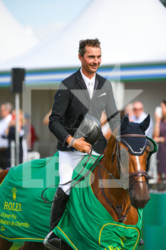 2021-07-11 - Nicolas Delmotte of France riding Urvoso du Roch after winning the Rolex Grand Prix Table A against the clock 1m60 with jump off, of the Masters Chantilly 2021, FEI equestrian event, Jumping CSI5 on July 11, 2021 at Chateau de Chantilly in Chantilly, France - Photo Victor Joly / DPPI - MASTERS CHANTILLY 2021, FEI EQUESTRIAN EVENT, JUMPING CSI5 - INTERNATIONALS - EQUESTRIAN