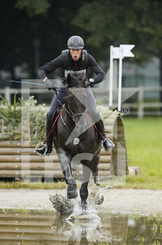 2021-07-17 - Jerome Robine riding Black Ice during the cross country CCI4-S at Jardy Eventing Show 2021 on July 17, 2021 in Marne la Coquette, France - Photo Christophe Bricot / DPPI - JARDY EVENTING SHOW 2021 - INTERNATIONALS - EQUESTRIAN