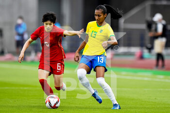 2021-07-21 - Xin Zhang of China and Bruna Benites of Brazil during the Olympic Games Tokyo 2020, Football Women's First Round, Group F, between China and Brazil on July 21, 2021 at Miyagi Stadium in Rifu, Japan - Photo Pablo Morano / Orange Pictures / DPPI - OLYMPIC GAMES TOKYO 2020, JULY 21, 2021 - OLYMPIC GAMES TOKYO 2020 - OLYMPIC GAMES