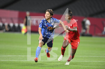 2021-07-21 - Mana IWABUCHI (JPN) Kadeisha BUCHANAN (CAN) during the Olympic Games Tokyo 2020, Football Women's First Round, Group E, between Japan and Canada on July 21, 2021 at Sapporo Dome in Sapporo, Japan - Photo Photo Kishimoto / DPPI - OLYMPIC GAMES TOKYO 2020, JULY 21, 2021 - OLYMPIC GAMES TOKYO 2020 - OLYMPIC GAMES