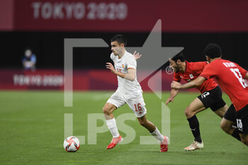 2021-07-22 - Pedri GONZALEZ (ESP) Akram TAWFIK (EGY) during the Olympic Games Tokyo 2020, Football Men's First Round Group C, between Egypt and Spain on July 22, 2021 at Sapporo Dome in Sapporo, Japan - Photo Photo Kishimoto / DPPI - OLYMPIC GAMES TOKYO 2020, JULY 22, 2021 - OLYMPIC GAMES TOKYO 2020 - OLYMPIC GAMES
