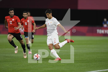 2021-07-22 - Akram TAWFIK (EGY) Marco ASENSIO (ESP) during the Olympic Games Tokyo 2020, Football Men's First Round Group C, between Egypt and Spain on July 22, 2021 at Sapporo Dome in Sapporo, Japan - Photo Photo Kishimoto / DPPI - OLYMPIC GAMES TOKYO 2020, JULY 22, 2021 - OLYMPIC GAMES TOKYO 2020 - OLYMPIC GAMES