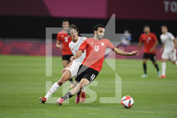 2021-07-22 - Bryan GIL (ESP) Karim ERAKY (EGY) during the Olympic Games Tokyo 2020, Football Men's First Round Group C, between Egypt and Spain on July 22, 2021 at Sapporo Dome in Sapporo, Japan - Photo Photo Kishimoto / DPPI - OLYMPIC GAMES TOKYO 2020, JULY 22, 2021 - OLYMPIC GAMES TOKYO 2020 - OLYMPIC GAMES