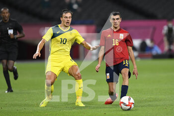 2021-07-25 - Denis GENREAU (AUS) Pedri GONZALEZ (ESP) during the Olympic Games Tokyo 2020, Football Men's First Round Group C on July 25, 2021 at Sapporo Dome in Sapporo, Japan - Photo Photo Kishimoto / DPPI - OLYMPIC GAMES TOKYO 2020, JULY 25, 2021 - OLYMPIC GAMES TOKYO 2020 - OLYMPIC GAMES