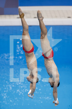 2021-07-26 - CAO Yuan, CHEN Aisen (CHN) Silver Medal during the Olympic Games Tokyo 2020, Swimming Diving Men's Synchronised 10m Platform Final on July 26, 2021 at Tokyo Aquatics Centre in Tokyo, Japan - Photo Takamitsu Mifune / Photo Kishimoto / DPPI - OLYMPIC GAMES TOKYO 2020, JULY 26, 2021 - OLYMPIC GAMES TOKYO 2020 - OLYMPIC GAMES