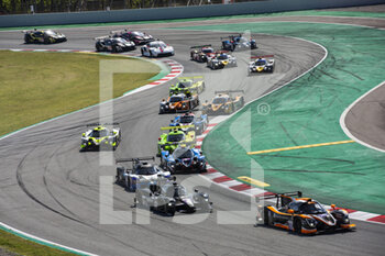 2021-04-18 - 15 Benham Mikael (gbr), Kapadia Alex (gbr), Jakobsen Malthe (den), RLR Msport, Ligier JS P320 - Nissan, action leading the start of the race, depart, during the 2021 4 Hours of Barcelona, 1st round of the 2021 European Le Mans Series, from April 15 to 17, 2021 on the Circuit de Barcelona-Catalunya, in Montmelo, near Barcelona, Spain - Photo Xavi Bonilla / DPPI - 2021 4 HOURS OF BARCELONA, 1ST ROUND OF THE 2021 EUROPEAN LE MANS SERIES - ENDURANCE - MOTORS