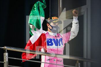 2020-12-06 - PEREZ Sergio (mex), Racing Point F1 RP20, portrait, celebrating his first win on the podium during the Formula 1 Rolex Sakhir Grand Prix 2020, from December 4 to 6, 2020 on the Bahrain International Circuit, in Sakhir, Bahrain - Photo Antonin Vincent / DPPI - FORMULA 1 ROLEX SAKHIR GRAND PRIX 2020 - SUNDAY - FORMULA 1 - MOTORS