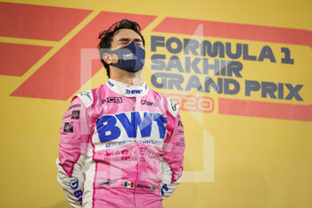 2020-12-06 - PEREZ Sergio (mex), Racing Point F1 RP20, portrait, celebrating his first win on the podium during the Formula 1 Rolex Sakhir Grand Prix 2020, from December 4 to 6, 2020 on the Bahrain International Circuit, in Sakhir, Bahrain - Photo Antonin Vincent / DPPI - FORMULA 1 ROLEX SAKHIR GRAND PRIX 2020 - SUNDAY - FORMULA 1 - MOTORS