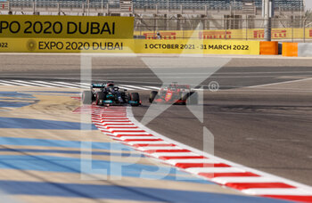 2021-03-27 - 44 HAMILTON Lewis (gbr), Mercedes AMG F1 GP W12 E Performance, action 16 LECLERC Charles (mco), Scuderia Ferrari SF21, action during Formula 1 Gulf Air Bahrain Grand Prix 2021 from March 26 to 28, 2021 on the Bahrain International Circuit, in Sakhir, Bahrain - Photo DPPI - FORMULA 1 GULF AIR BAHRAIN GRAND PRIX 2021 - FORMULA 1 - MOTORS