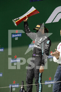 2021-05-02 - HAMILTON Lewis (gbr), Mercedes AMG F1 GP W12 E Performance, portrait celebrating his victory at the podium during the Formula 1 Heineken Grande Prémio de Portugal 2021 from April 30 to May 2, 2021 on the Algarve International Circuit, in Portimao, Portugal - Photo DPPI - FORMULA 1 HEINEKEN GRANDE PREMIO DE PORTUGAL 2021 - FORMULA 1 - MOTORS