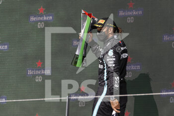2021-05-02 - HAMILTON Lewis (gbr), Mercedes AMG F1 GP W12 E Performance, portrait celebrating the victory at the podium during the Formula 1 Heineken Grande Prémio de Portugal 2021 from April 30 to May 2, 2021 on the Algarve International Circuit, in Portimao, Portugal - Photo DPPI - FORMULA 1 HEINEKEN GRANDE PREMIO DE PORTUGAL 2021 - FORMULA 1 - MOTORS