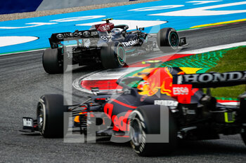 2021-06-27 - BOTTAS Valtteri (fin), Mercedes AMG F1 GP W12 E Performance, PEREZ Sergio (mex), Red Bull Racing Honda RB16B, action during the Formula 1 Grosser Preis Der Steiermark 2021, 2021 Styrian Grand Prix, 8th round of the 2021 FIA Formula One World Championship from June 25 to 27, 2021 on the Red Bull Ring, in Spielberg, Austria - Photo Florent Gooden / DPPI - FORMULA 1 GROSSER PREIS DER STEIERMARK 2021, 2021 STYRIAN GRAND PRIX - FORMULA 1 - MOTORS