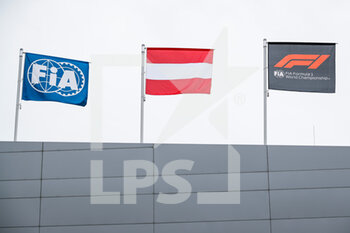 2021-07-01 - Austrian, FIA and F1 flags during the Formula 1 Grosser Preis Von Osterreich 2021, 2021 Austrian Grand Prix, 9th round of the 2021 FIA Formula One World Championship from July 2 to 4, 2021 on the Red Bull Ring, in Spielberg, Austria - Photo Florent Gooden / DPPI - FORMULA 1 GROSSER PREIS VON OSTERREICH 2021, 2021 AUSTRIAN GRAND PRIX - FORMULA 1 - MOTORS