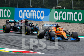 2021-07-04 - NORRIS Lando (gbr), McLaren MCL35M, HAMILTON Lewis (gbr), Mercedes AMG F1 GP W12 E Performance, action during the Formula 1 Grosser Preis Von Osterreich 2021, 2021 Austrian Grand Prix, 9th round of the 2021 FIA Formula One World Championship from July 2 to 4, 2021 on the Red Bull Ring, in Spielberg, Austria - Photo Florent Gooden / DPPI - FORMULA 1 GROSSER PREIS VON OSTERREICH 2021, 2021 AUSTRIAN GRAND PRIX - FORMULA 1 - MOTORS
