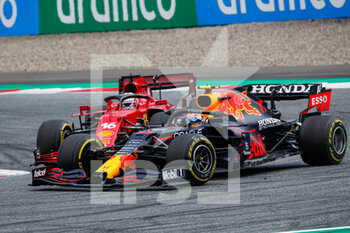 2021-07-04 - PEREZ Sergio (mex), Red Bull Racing Honda RB16B, 16 LECLERC Charles (mco), Scuderia Ferrari SF21, action during the Formula 1 Grosser Preis Von Osterreich 2021, 2021 Austrian Grand Prix, 9th round of the 2021 FIA Formula One World Championship from July 2 to 4, 2021 on the Red Bull Ring, in Spielberg, Austria - Photo Florent Gooden / DPPI - FORMULA 1 GROSSER PREIS VON OSTERREICH 2021, 2021 AUSTRIAN GRAND PRIX - FORMULA 1 - MOTORS