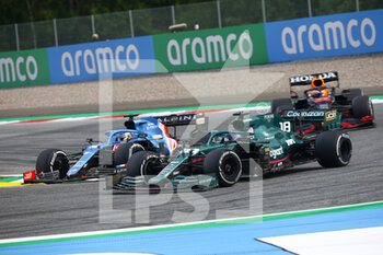 2021-07-04 - 14 ALONSO Fernando (spa), Alpine F1 A521, action with 18 STROLL Lance (can), Aston Martin F1 AMR21 during the Formula 1 Grosser Preis Von Osterreich 2021, 2021 Austrian Grand Prix, 9th round of the 2021 FIA Formula One World Championship from July 2 to 4, 2021 on the Red Bull Ring, in Spielberg, Austria - Photo Joao Filipe / DPPI - FORMULA 1 GROSSER PREIS VON OSTERREICH 2021, 2021 AUSTRIAN GRAND PRIX - FORMULA 1 - MOTORS