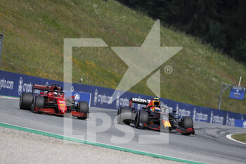 2021-07-04 - 16 LECLERC Charles (mco), Scuderia Ferrari SF21, action with 11 PEREZ Sergio (mex), Red Bull Racing Honda RB16B during the Formula 1 Grosser Preis Von Osterreich 2021, 2021 Austrian Grand Prix, 9th round of the 2021 FIA Formula One World Championship from July 2 to 4, 2021 on the Red Bull Ring, in Spielberg, Austria - Photo Florent Gooden / DPPI - FORMULA 1 GROSSER PREIS VON OSTERREICH 2021, 2021 AUSTRIAN GRAND PRIX - FORMULA 1 - MOTORS