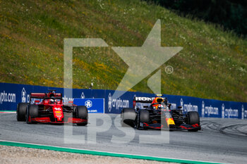 2021-07-04 - 16 LECLERC Charles (mco), Scuderia Ferrari SF21, 11 PEREZ Sergio (mex), Red Bull Racing Honda RB16B, action during the Formula 1 Grosser Preis Von Osterreich 2021, 2021 Austrian Grand Prix, 9th round of the 2021 FIA Formula One World Championship from July 2 to 4, 2021 on the Red Bull Ring, in Spielberg, Austria - Photo Florent Gooden / DPPI - FORMULA 1 GROSSER PREIS VON OSTERREICH 2021, 2021 AUSTRIAN GRAND PRIX - FORMULA 1 - MOTORS