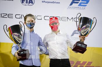 2020-12-06 - Schumacher Mick (ger), Prema Racing, Dallara F2 2018, portrait, celebrating with Piastri Oscar (aus), Prema Racing, Dallara F3 2019, during the F2 & F3 Prize giving Ceremony of the 2020 season, December 6, 2020 on the Bahrain International Circuit, in Sakhir, Bahrain - Photo Florent Gooden / DPPI - 12TH ROUND OF THE 2020 FIA FORMULA 2 CHAMPIONSHIP - SUNDAY - FORMULA 2 - MOTORS
