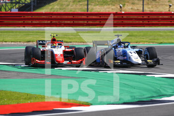 2021-07-18 - 02 Piastri Oscar (aus), Prema Racing, Dallara F2, action 11 Verschoor Richard (nld), MP Motorsport, Dallara F2, action during the 4th round of the 2021 FIA Formula 2 Championship from from July 16 to 18, 2021 on the Silverstone Circuit, in Silverstone, United Kingdom - Photo Xavi Bonilla / DPPI - 4TH ROUND OF THE 2021 FIA FORMULA 2 CHAMPIONSHIP - FORMULA 2 - MOTORS