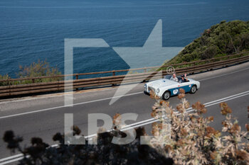 2021-06-16 - A car drives on the coast highway in during the first secon of the Mille Miglia 2021  on june 17, 202, Italy. Photo by Gianluca Checchi/New Reporter - MILLE MIGLIA 2021  - HISTORIC - MOTORS