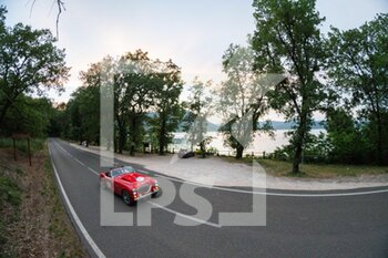 2021-06-16 - A car passes by the lago di Bolsena during the second leg of the Mille Miglia 2021  on june 17, 2021 in, Bolsena  Italy. Photo by Gianluca Checchi/New Reporter - MILLE MIGLIA 2021  - HISTORIC - MOTORS