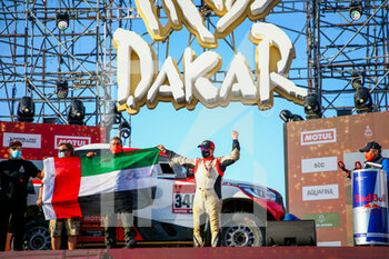 2021-01-15 - 346 Aljafla Khalid (are), Mirza Ali (are), Toyota, Sarab Racing, Auto, portrait during the finishing podium ceremony at the King Abdullah International Stadium in Jeddah, in Saudi Arabia on January 15, 2021 - Photo Julien Delfosse / DPPI - 12TH STAGE OF THE DAKAR 2021 BETWEEN YANBU AND JEDDAH - RALLY - MOTORS