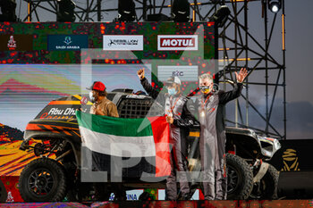 2021-01-15 - 386 Al Helei Mansour (are), Orr Michael (gbr), PH Sport, Abu Dhabi Racing, Light Weight Vehicles Prototype - T3, portrait during the finishing podium ceremony at the King Abdullah International Stadium in Jeddah, in Saudi Arabia on January 15, 2021 - Photo Florent Gooden / DPPI - 12TH STAGE OF THE DAKAR 2021 BETWEEN YANBU AND JEDDAH - RALLY - MOTORS