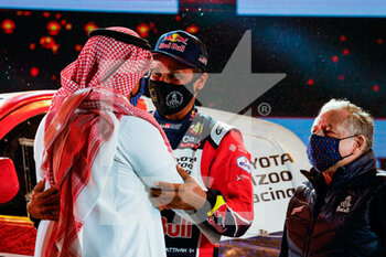 2021-01-15 - during the finishing podium ceremony at the King Abdullah International Stadium in Jeddah, in Saudi Arabia on January 15, 2021 - Photo Antonin Vincent / DPPI - 12TH STAGE OF THE DAKAR 2021 BETWEEN YANBU AND JEDDAH - RALLY - MOTORS
