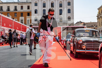 2021-06-15 - A sanitation officer in action  during the first day of the Vittoria Square red carpet of the Mille Miglia 2021  on june 15, 2021 in Brescia, Italy. Photo by Stefano Nicoli/New Reporter - MILLE MIGLIA 2021  - HISTORIC - MOTORS