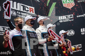 27/06/2021 - Ehrlacher Yann (fra), Cyan Racing Lynk & Co, Lync & Co 03 TCR, portrait, Muller Yvan (fra), Cyan Racing Lynk & Co, Lync & Co 03 TCR, portrait Urrutia Santiago (uru), Cyan Performance Lynk & Co, Lync & Co 03 TCR, portrait at the podium during the 2021 FIA WTCR Race of Portugal, 2nd round of the 2021 FIA World Touring Car Cup, on the Circuito do Estoril, from June 26 to 27, 2021 in Estoril, Portugal - Photo Xavi Bonilla / DPPI - 2021 FIA WTCR RACE OF PORTUGAL, 2ND ROUND OF THE 2021 FIA WORLD TOURING CAR CUP - TURISMO E GRAN TURISMO - MOTORI