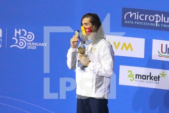 2021-05-20 - Robert-Andrei Glinta of Romania, 100 m Backstroke Podium 1st place during the 2021 LEN European Championships, Swimming event on May 20, 2021 at Duna Arena in Budapest, Hungary - Photo Laurent Lairys / DPPI - 2021 LEN EUROPEAN CHAMPIONSHIPS - SWIMMING - SWIMMING