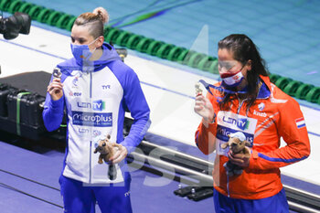2021-05-23 - Melanie Henique of France 2nd place, Ranomi Kromowidjojo of Netherlands 1st place, Podium 50 m Butterfly during the 2021 LEN European Championships, Swimming event on May 23, 2021 at Duna Arena in Budapest, Hungary - Photo Laurent Lairys / DPPI - 2021 LEN EUROPEAN CHAMPIONSHIPS - SWIMMING - SWIMMING